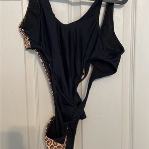 One piece, cross strapped bathing suit